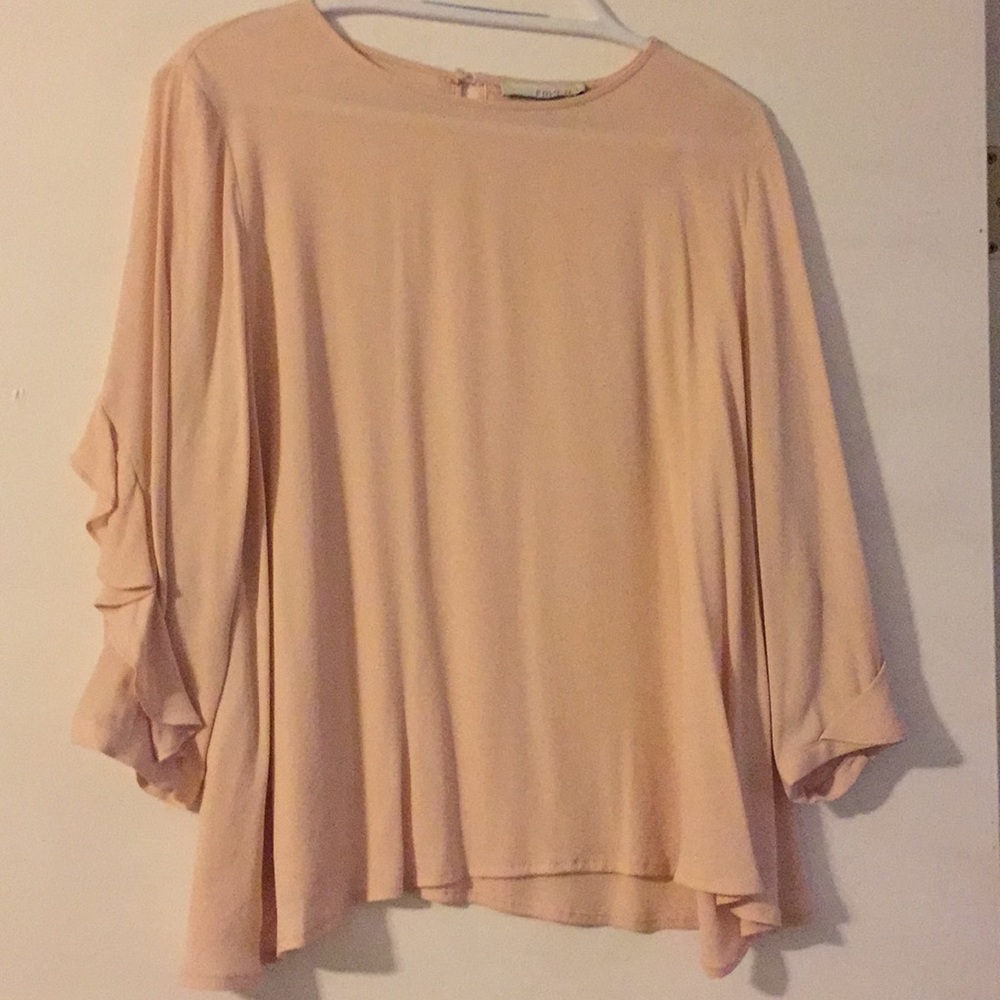 Blush colored flowing blouse